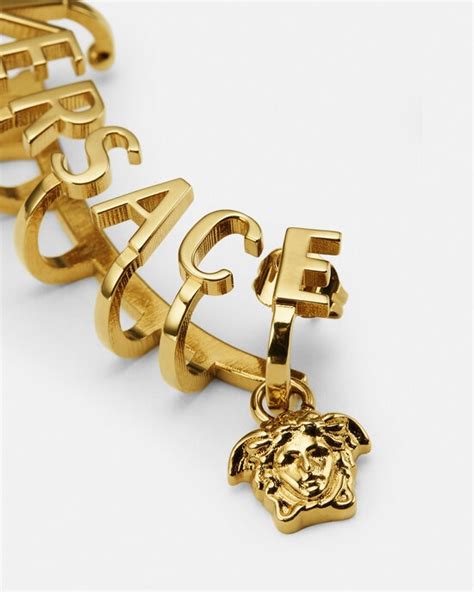 coppia orecchini uomo versace|Orecchini e ear cuff Versace da uomo .